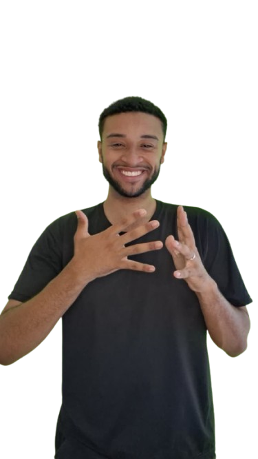 Intérprete de Libras sorridente fazendo o sinal de Libras para 'obrigado', com a mão sobre o peito